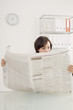 Businesswoman reading newspaper, portrait