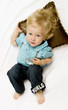 blond boy on a pillow blond boy on a pillow