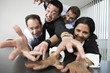 View of businesspeople grabbing