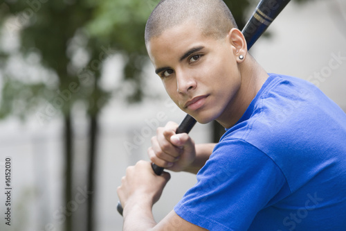Photo: Teen boy playing baseball Teen boy playing baseball