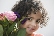 Photo: Cute Hispanic child with flowers Cute Hispanic child with flowers