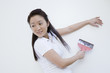 Asian woman scraping for paint