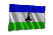 Lesotho flagge wehend