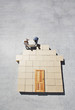 Couple building house outline on sidewalk