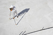 Surveyor working at new construction site