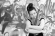 beautiful young woman holding violin