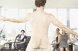 Naked businessman in office