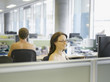 Naked businesspeople working in office