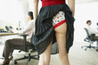 Businesswoman with skirt caught in underwear