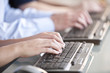 People Typing on Keyboards People Typing on Keyboards