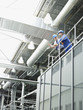 Businessmen in hard-hats talking
