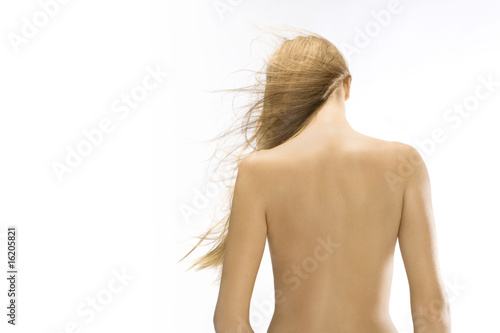 Photo: Nude woman with wind-blown blonde hair Nude woman with wind-blown blonde hair