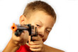 Foto: The boy looks in a sight of the toy weapon The boy looks in a sight of the toy weapon