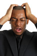 Business man with his hands on head due to failure Business man with his hands on head due to failure