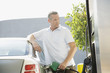 Man pumping gas