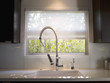 Interior of modern kitchen and spray nozzle