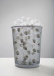 Wastebasket full of old-fashioned light bulbs