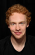 Man pulling unusual face