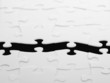 Separated halves of completed puzzle