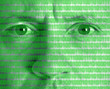 Montage of man?s face with binary code