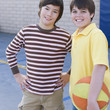 Boys outdoors with basketball