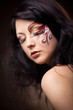 Long lashes and face-art