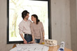 couple smiling about house plans