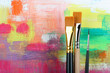 brushes on painted background..