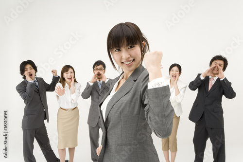 Photo: ガッツポーズをする女性 ガッツポーズをする女性