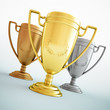 Gold, silver and bronze trophies.