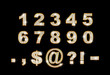 brilliant digits and signs on dark background