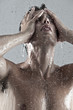 man under the shower.