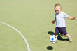 Boy playing football