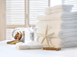 Fluffy white towels on table