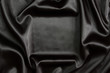 Black silk textile background