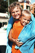 Foto: Portrait of brother and sister having fun on the beach Portrait of brother and sister having fun on the beach