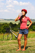 biking woman drinking water