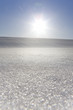 Sun shining on snowy field