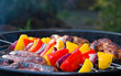 Vegetable kebabs on an outdoor barbecue