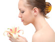 beautiful woman with lily flower on a white background