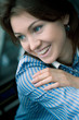 Photo: The young beautiful girl with blue eyes smiles The young beautiful girl with blue eyes smiles