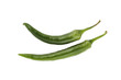 green hot chili peppers on white with clipping path