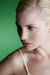 A portrait of a young blonde woman looking away