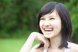 Photo: Beautiful Asian girl laughing outdoors Beautiful Asian girl laughing outdoors