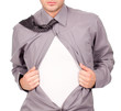 young attractive man pulling at his t-shirt