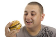 Hungry man with hamburger.