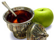 Silver honey dish with apple