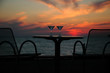 Table with goblets on background of the sundown Table with goblets on background of the sundown