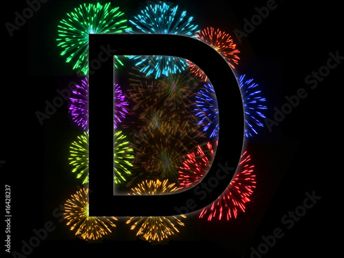 Photo : Lettre d alphabet avec feu d'artifice en arrière