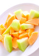 Juicy sliced melon on plate Juicy sliced melon on plate